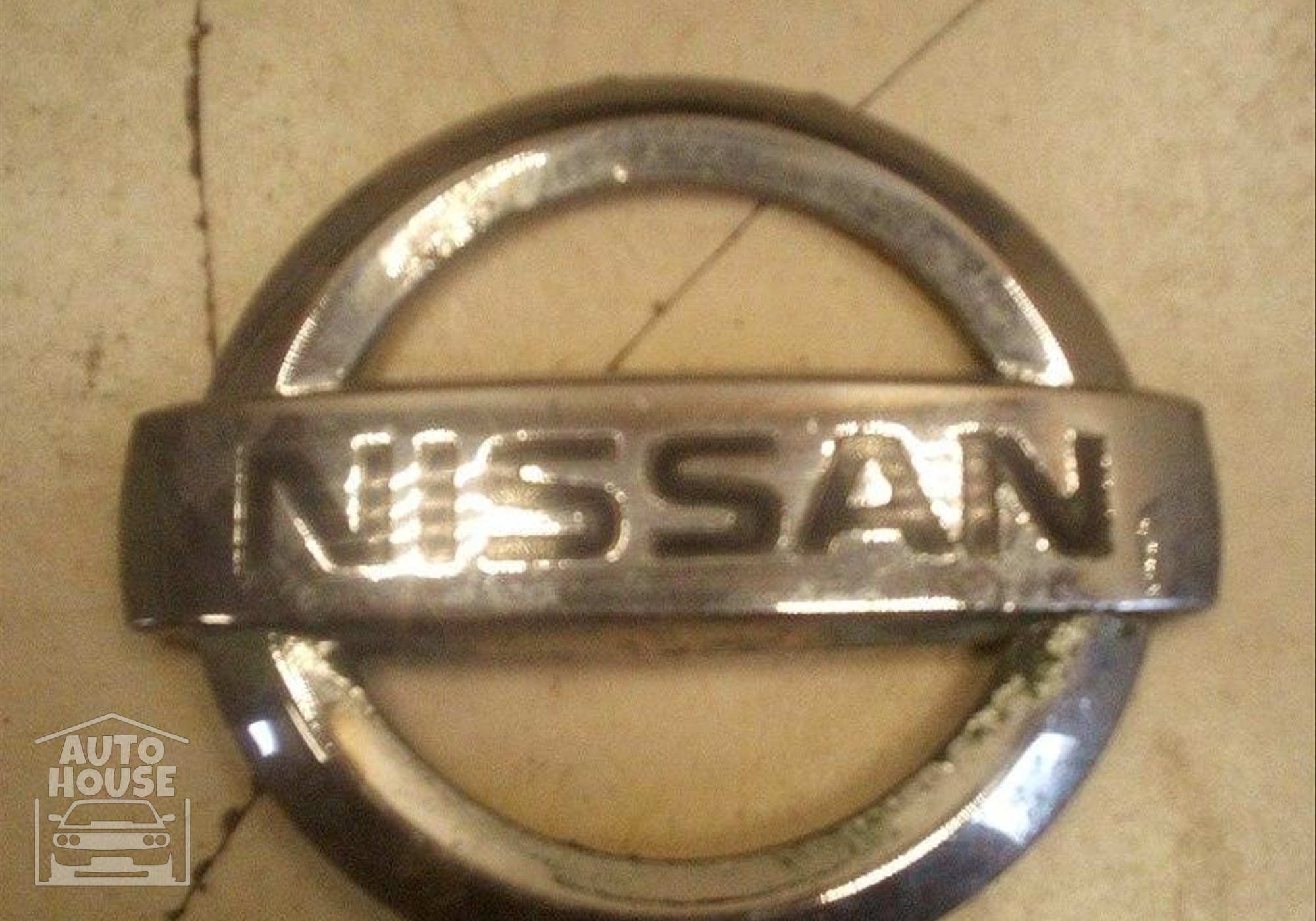 8660231900 Эмблема крышки багажника для Nissan Almera Classic (с 2006)