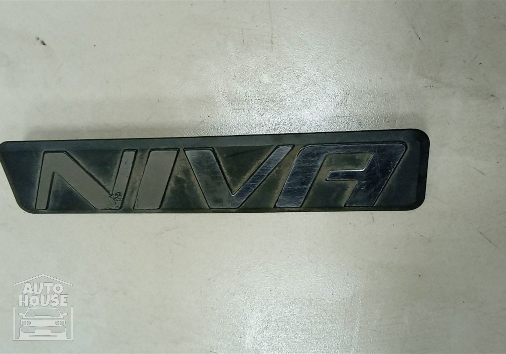 21238212204 Эмблема багажника задняя для Chevrolet Niva (с 2002)