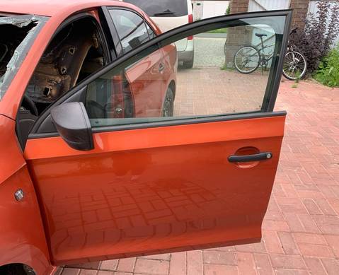 Дверь передняя левая оранжевая для Skoda Rapid I (с 2012 по 2020)