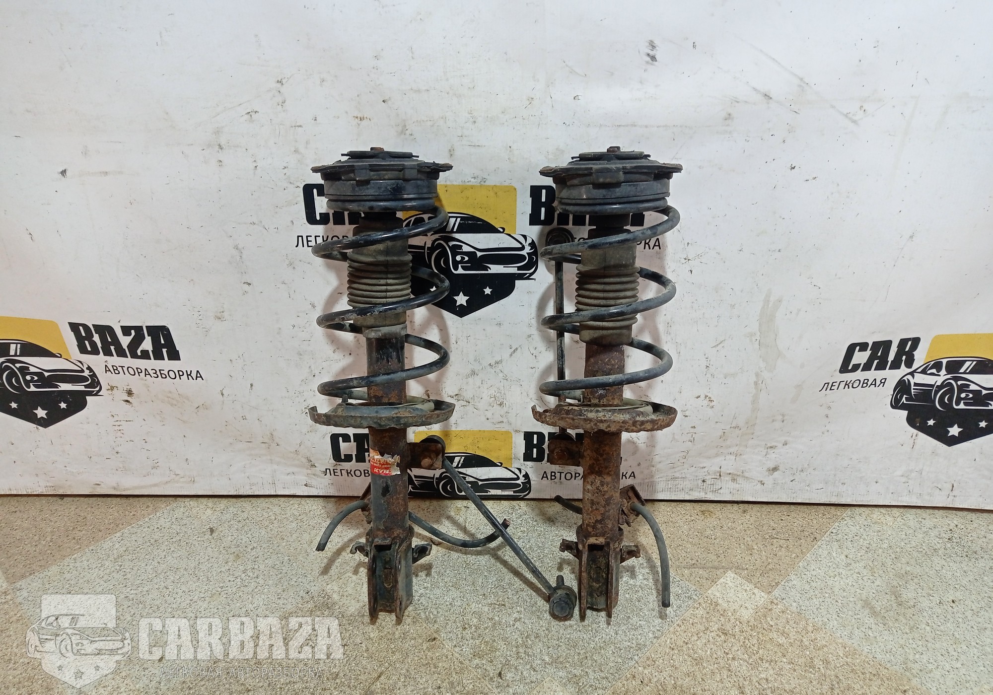 E43029U00C Амортизаторы передние E11 для Nissan Note I (с 2006 по 2013)