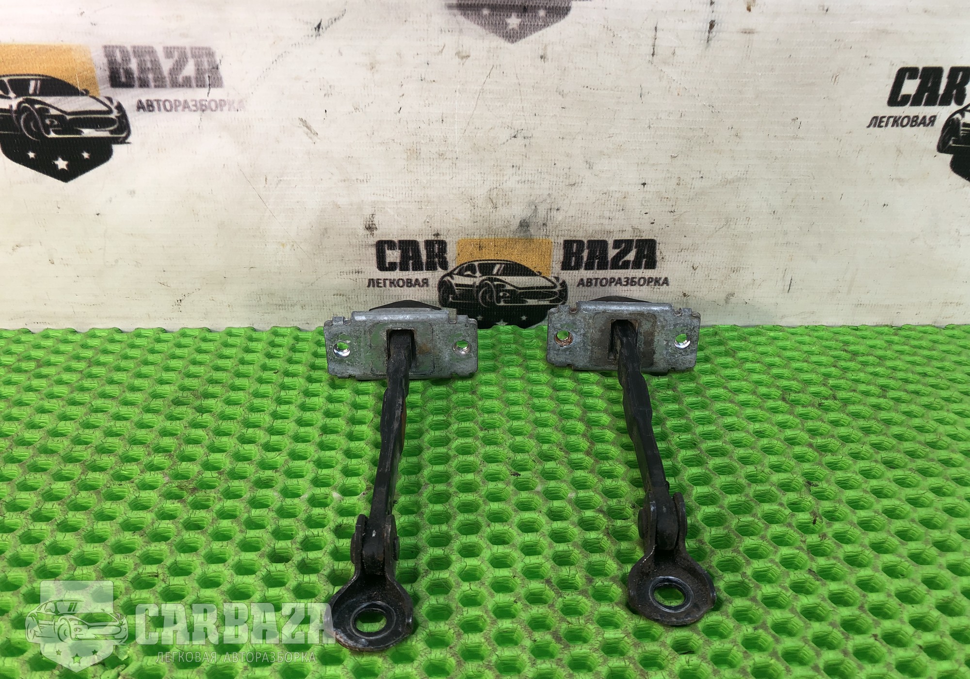 D65158270D Ограничители двери передние (комплект) для Mazda 2 II (с 2007 по 2014)