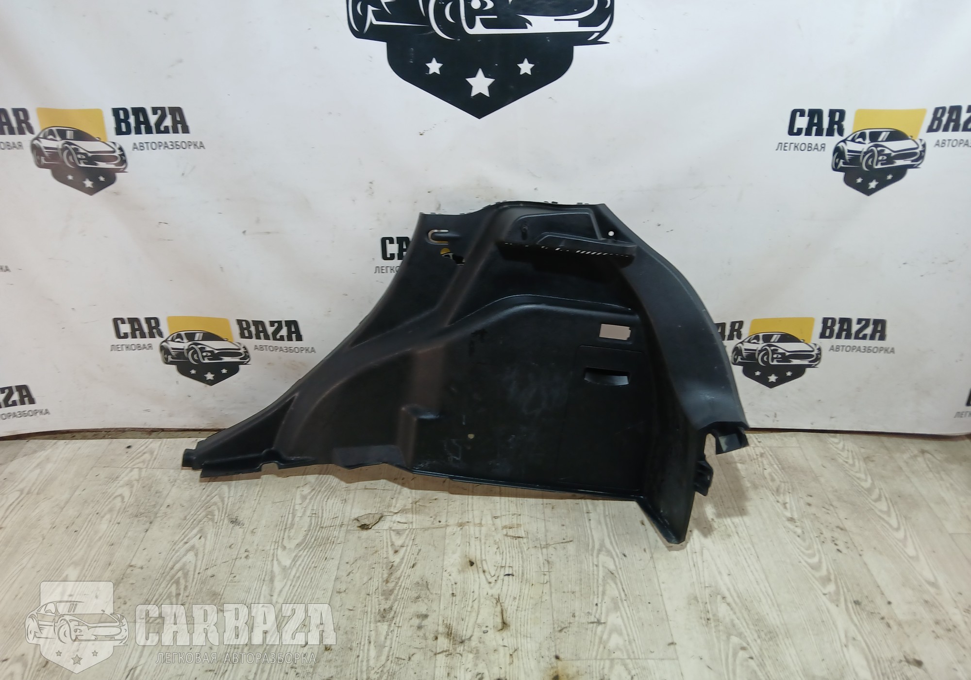 D65268870 Обшивка багажника правая для Mazda 2 II (с 2007 по 2014)