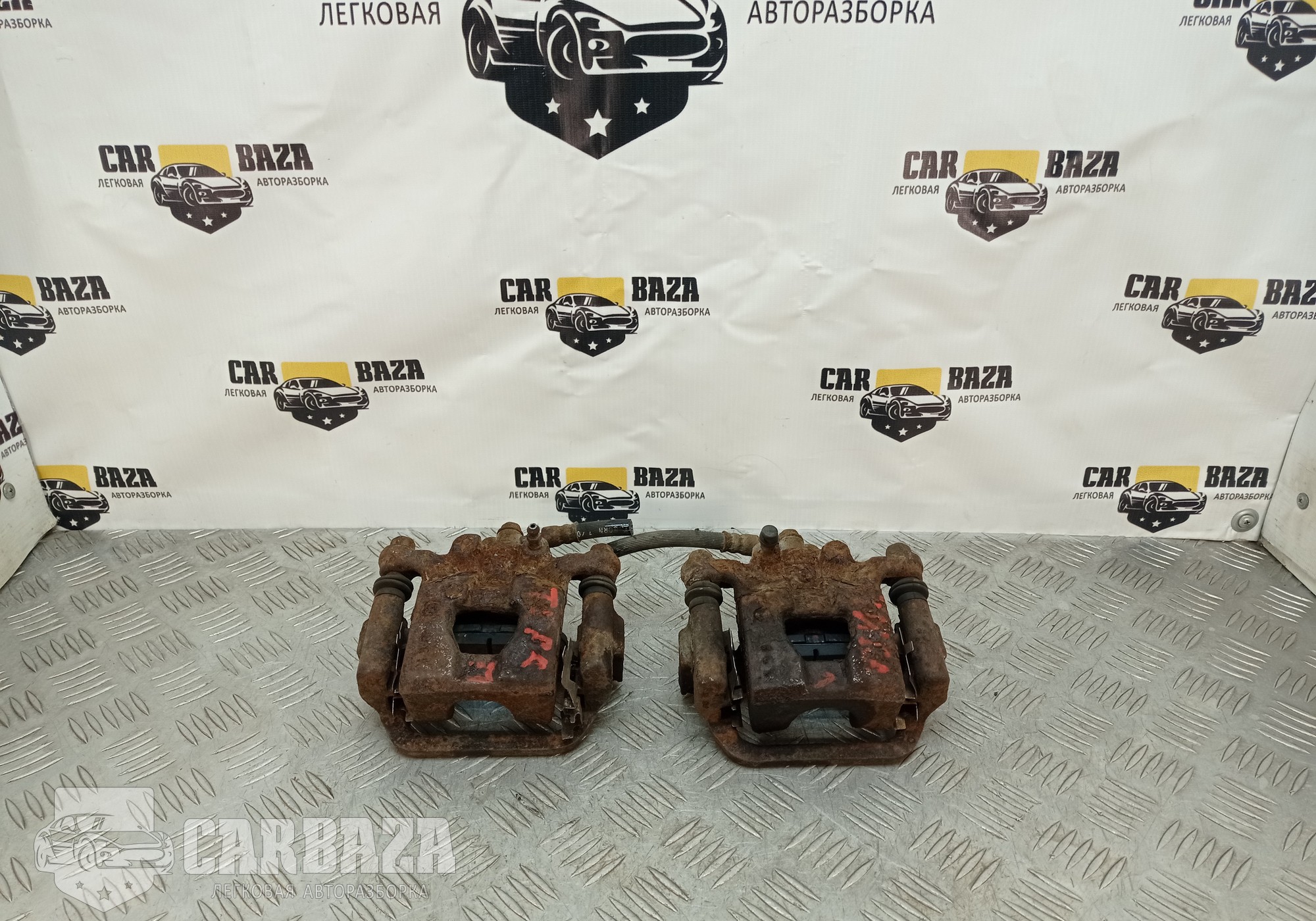 44001EM11A Суппорта задние для Nissan Cube