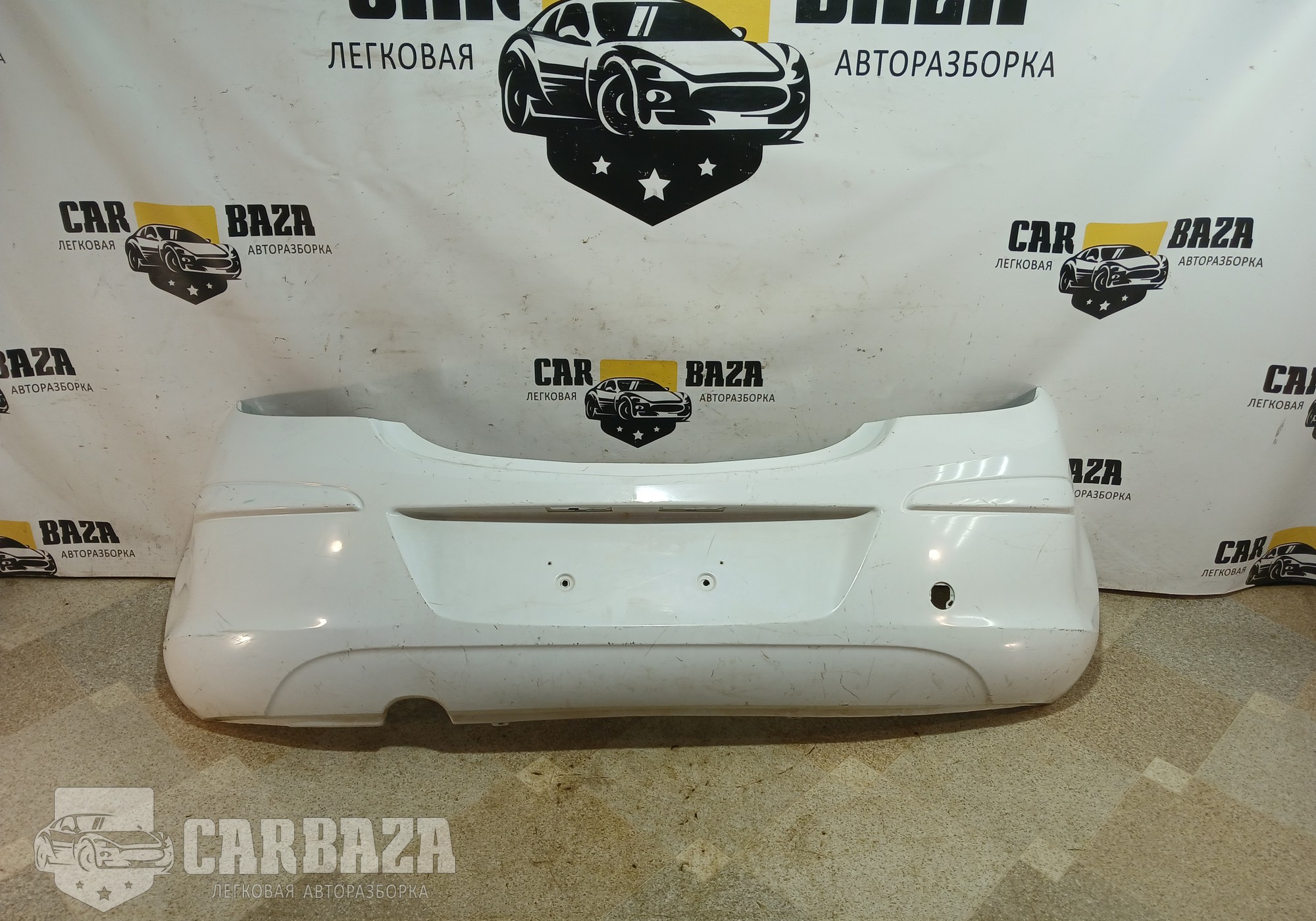 13179893 Бампер задний для Opel Corsa D (с 2006 по 2014)