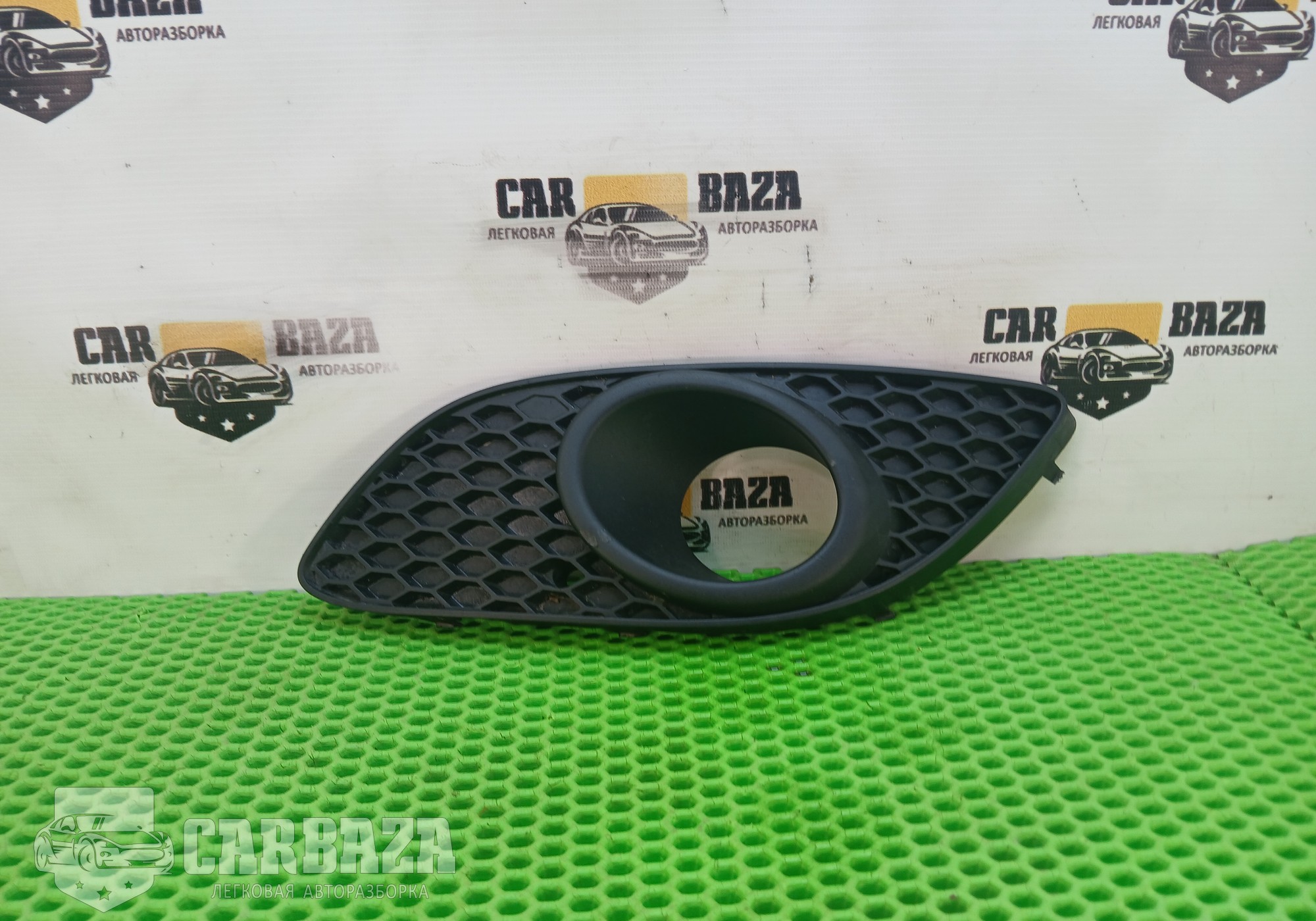 13247322 Накладка фары противотуманной левая для Opel Zafira B (с 2005 по 2014)