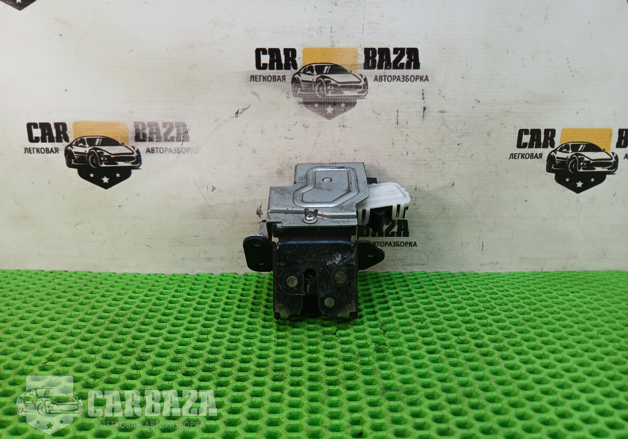DF7162310E Замок крышки багажника DE для Mazda 2 II (с 2007 по 2014)