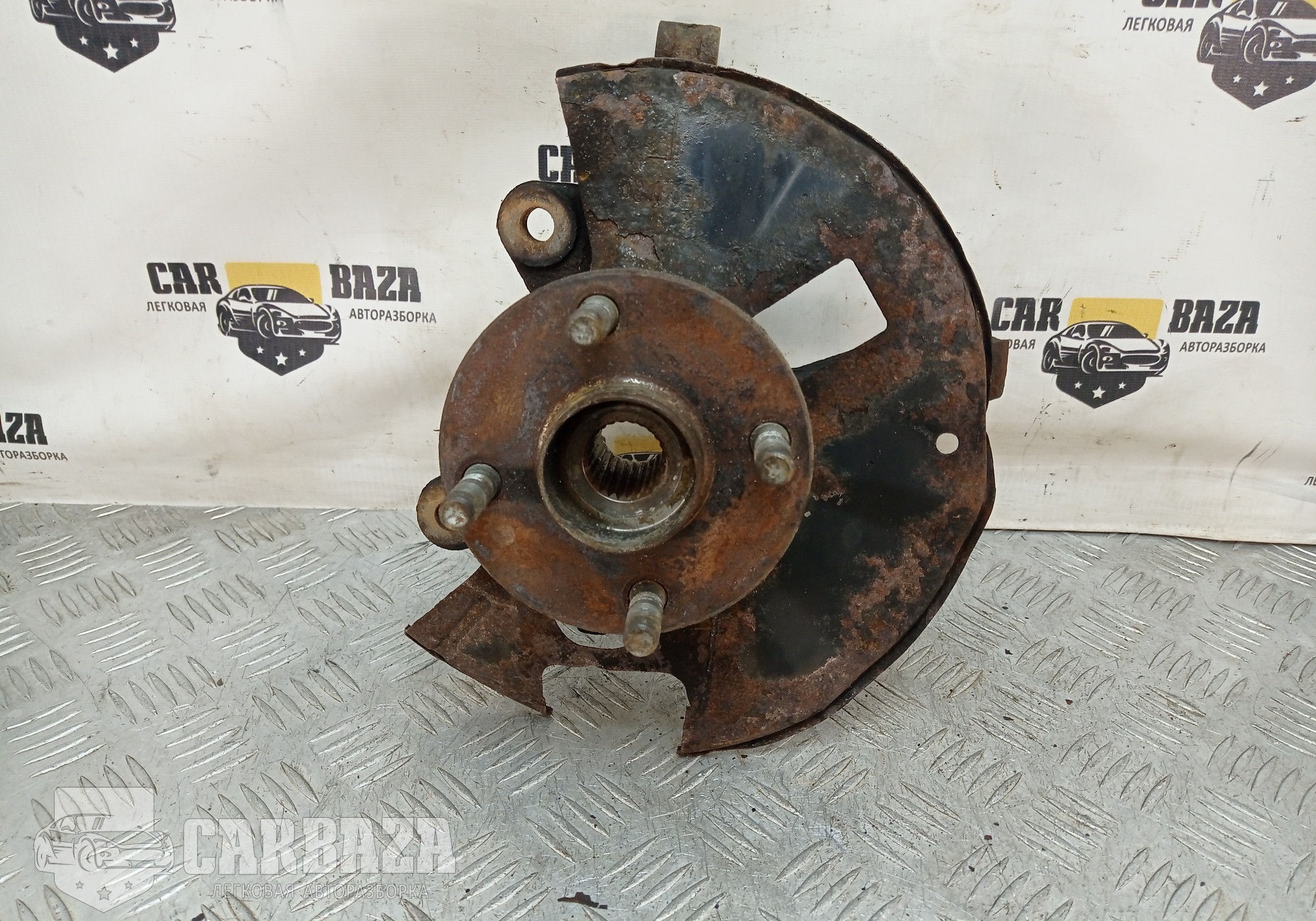 D65133031A Кулак поворотный левый для Mazda 2 II (с 2007 по 2014)