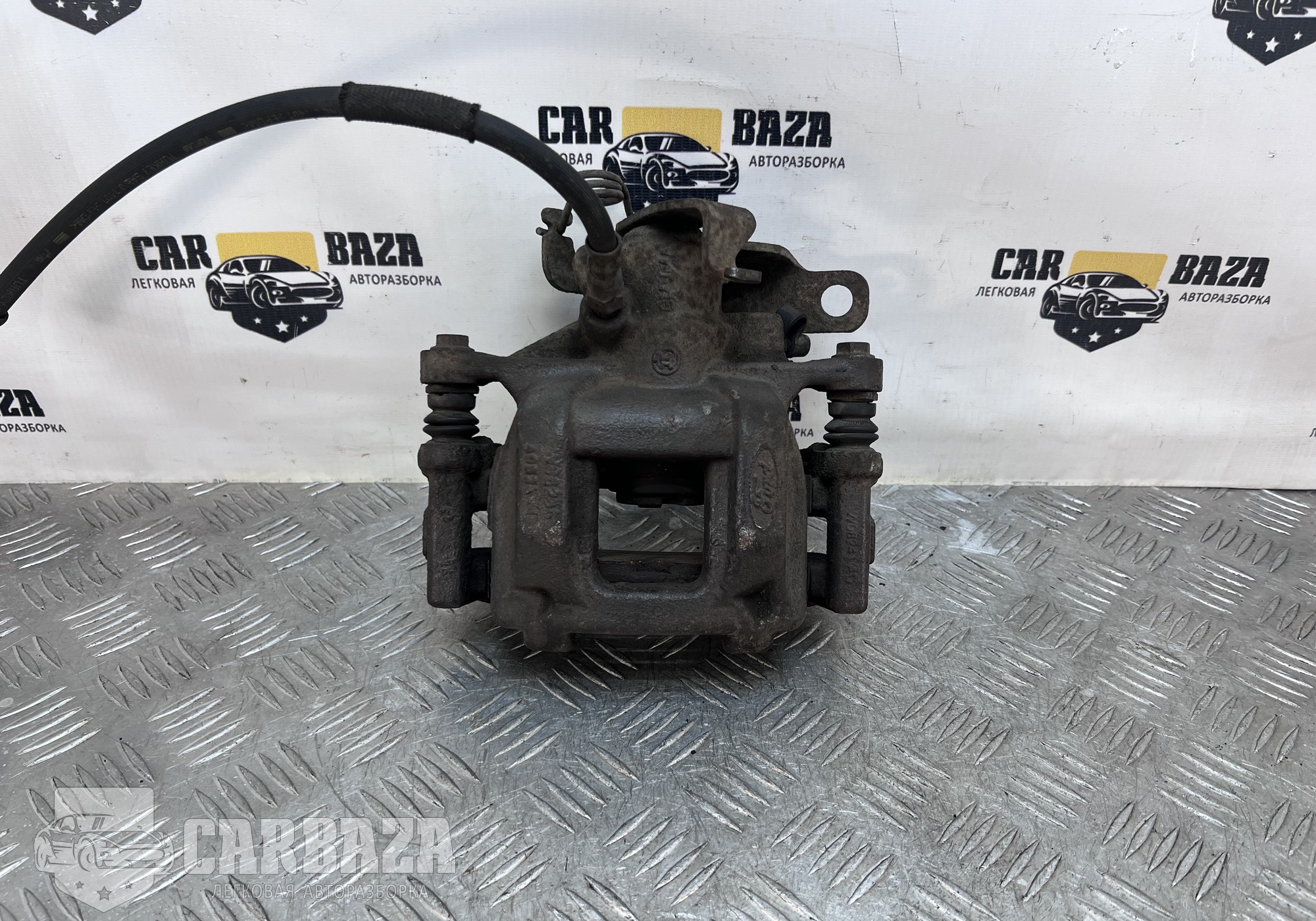 W08241AD Суппорт задний правый R для Ford Transit VIII (с 2013)