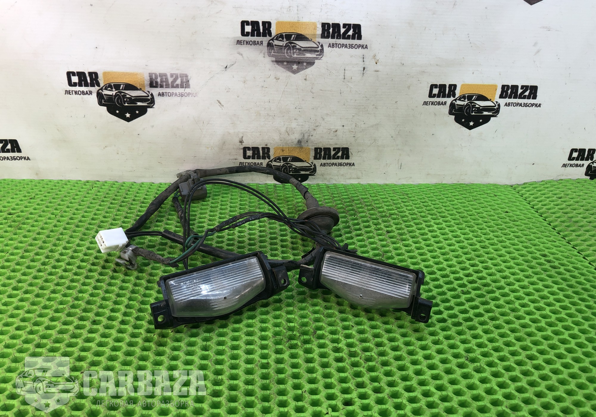 DF7351270K Подсветка номера для Mazda