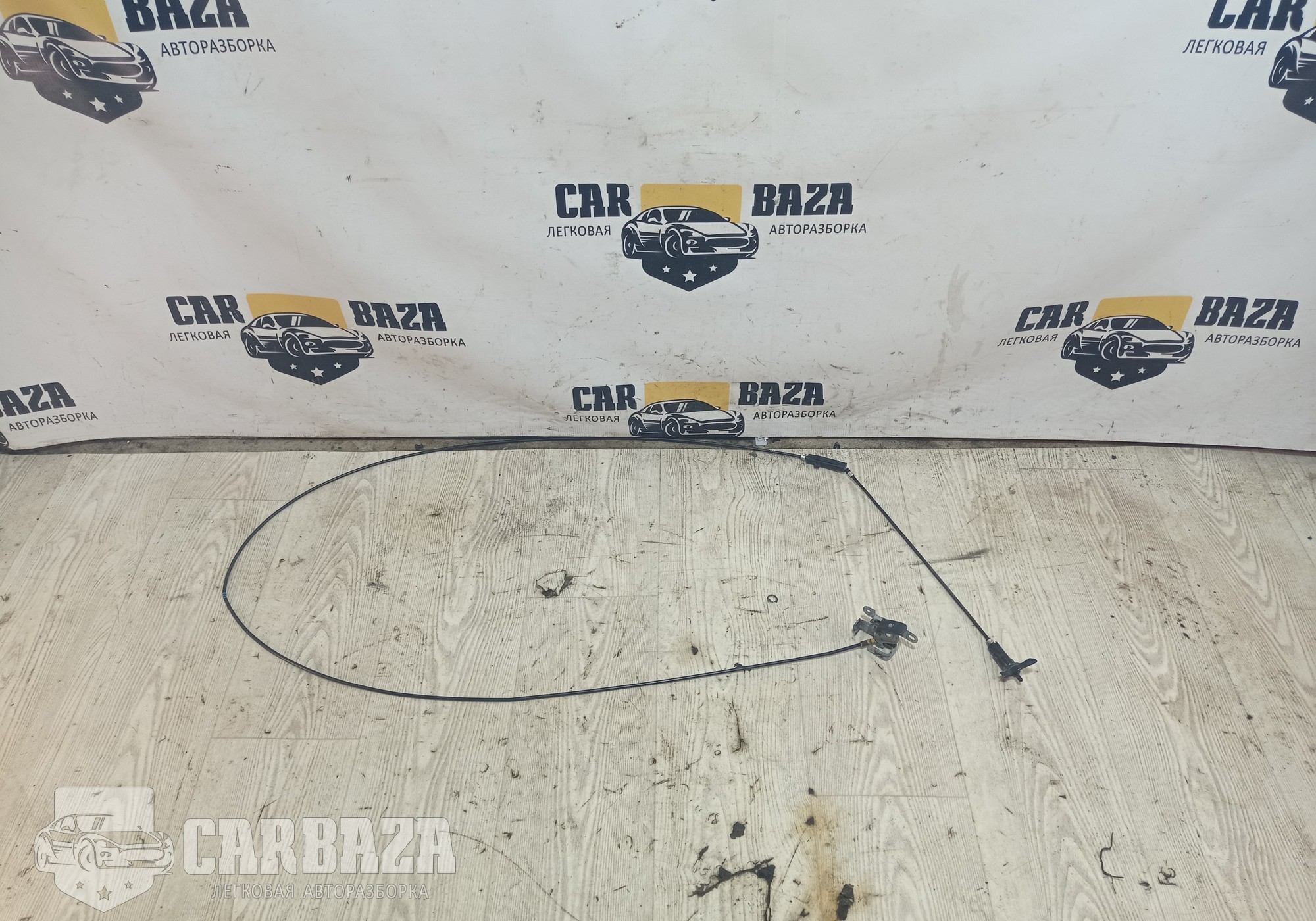 DF7156880 Трос лючка бензобака для Mazda 2 II (с 2007 по 2014)