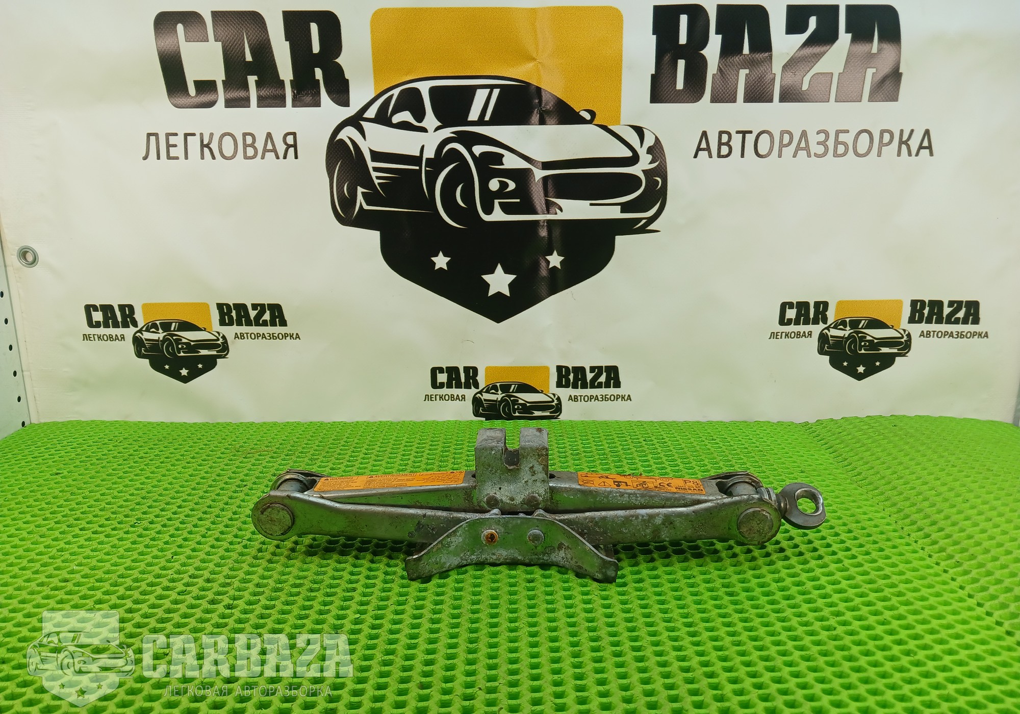 99550EL06C Домкрат С11 для Nissan Tiida I (с 2004 по 2014)