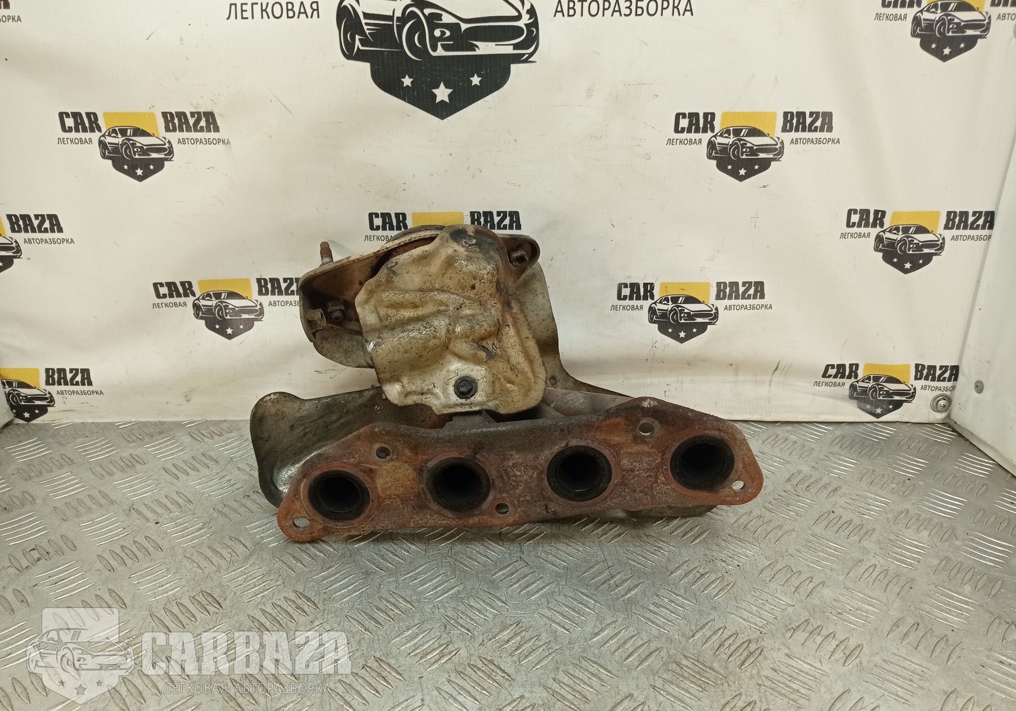 14002EE00A Коллектор выпускной HR16DE 1.6