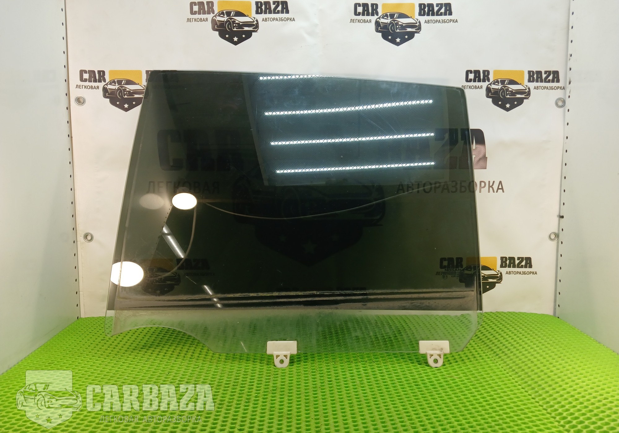 82301EL000 Стекло двери заднее левое С11 седан для Nissan Tiida I (с 2004 по 2014)