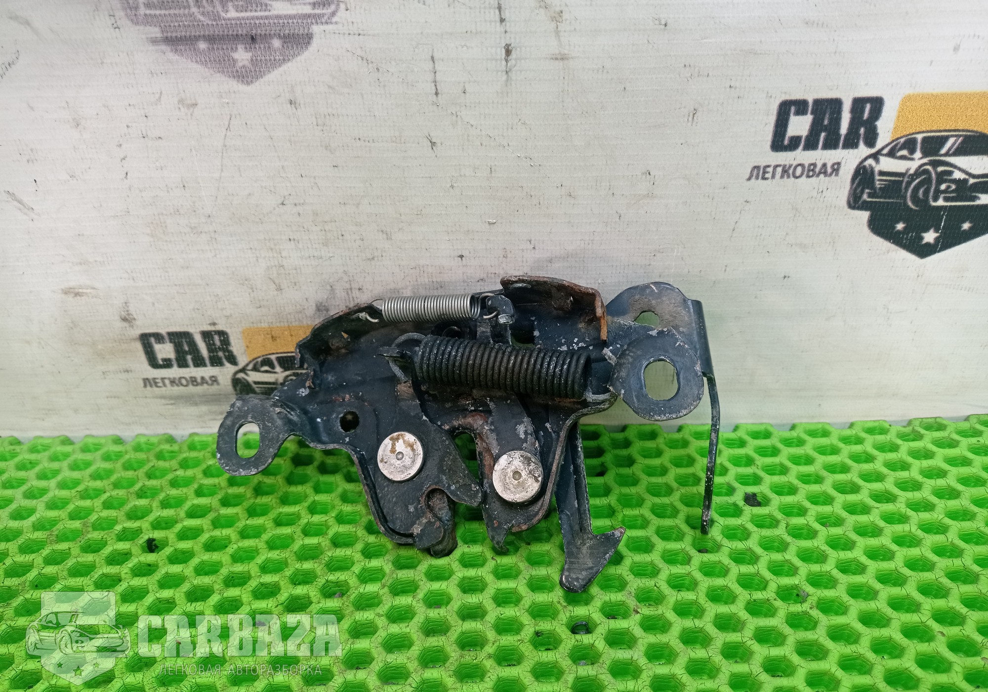 65601EL00C Замок капота C11 для Nissan Tiida I (с 2004 по 2014)