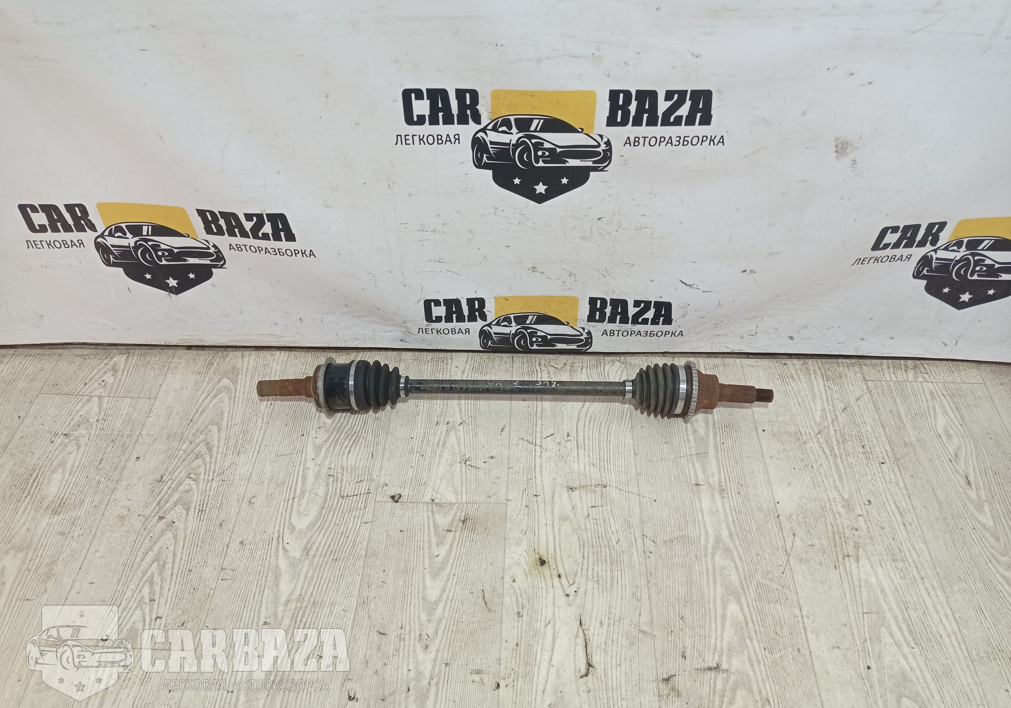 GD712560XA Привод задний левый для Mazda CX-7 (с 2006 по 2012)