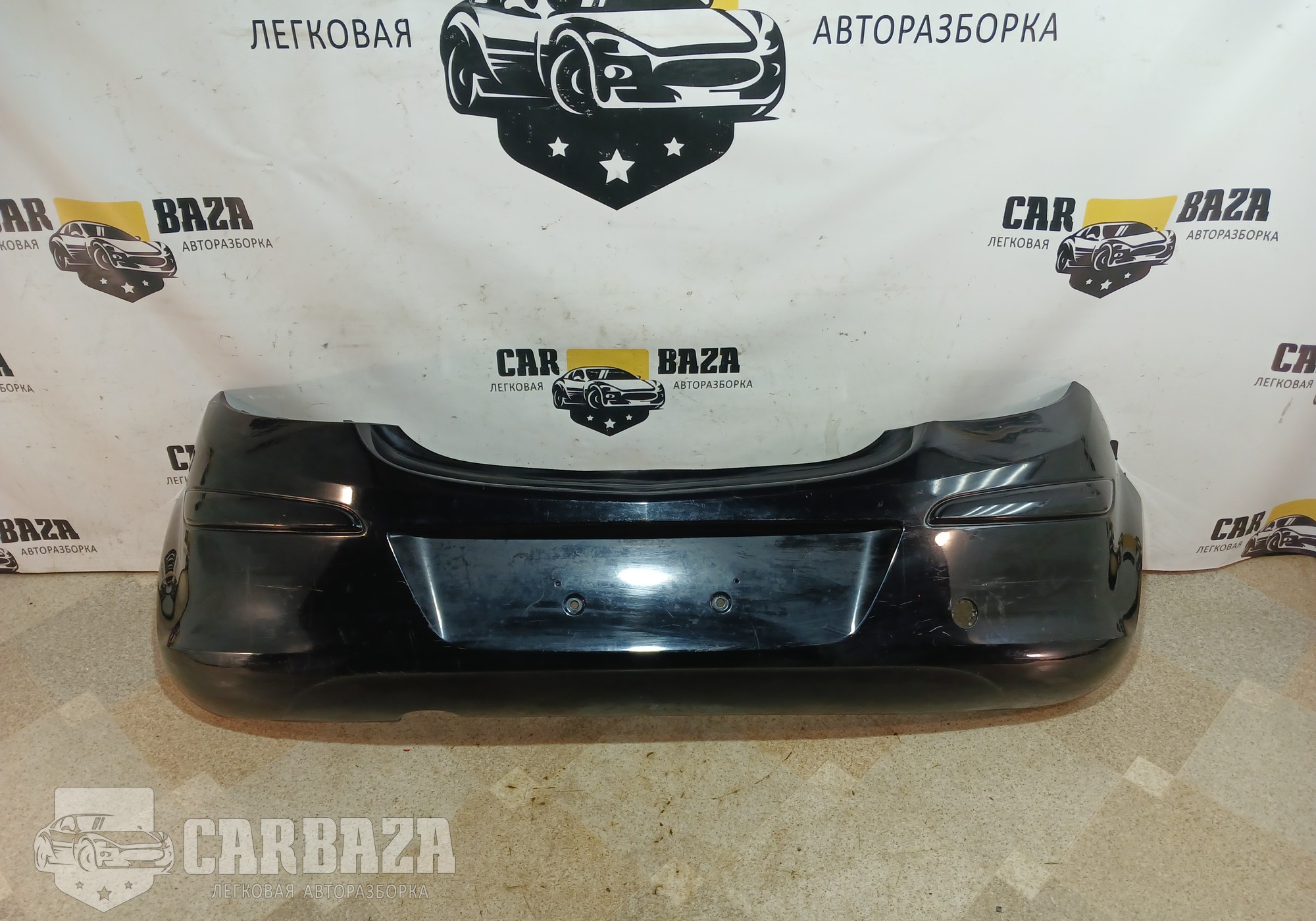 13179916 Бампер задний для Opel Corsa D (с 2006 по 2014)