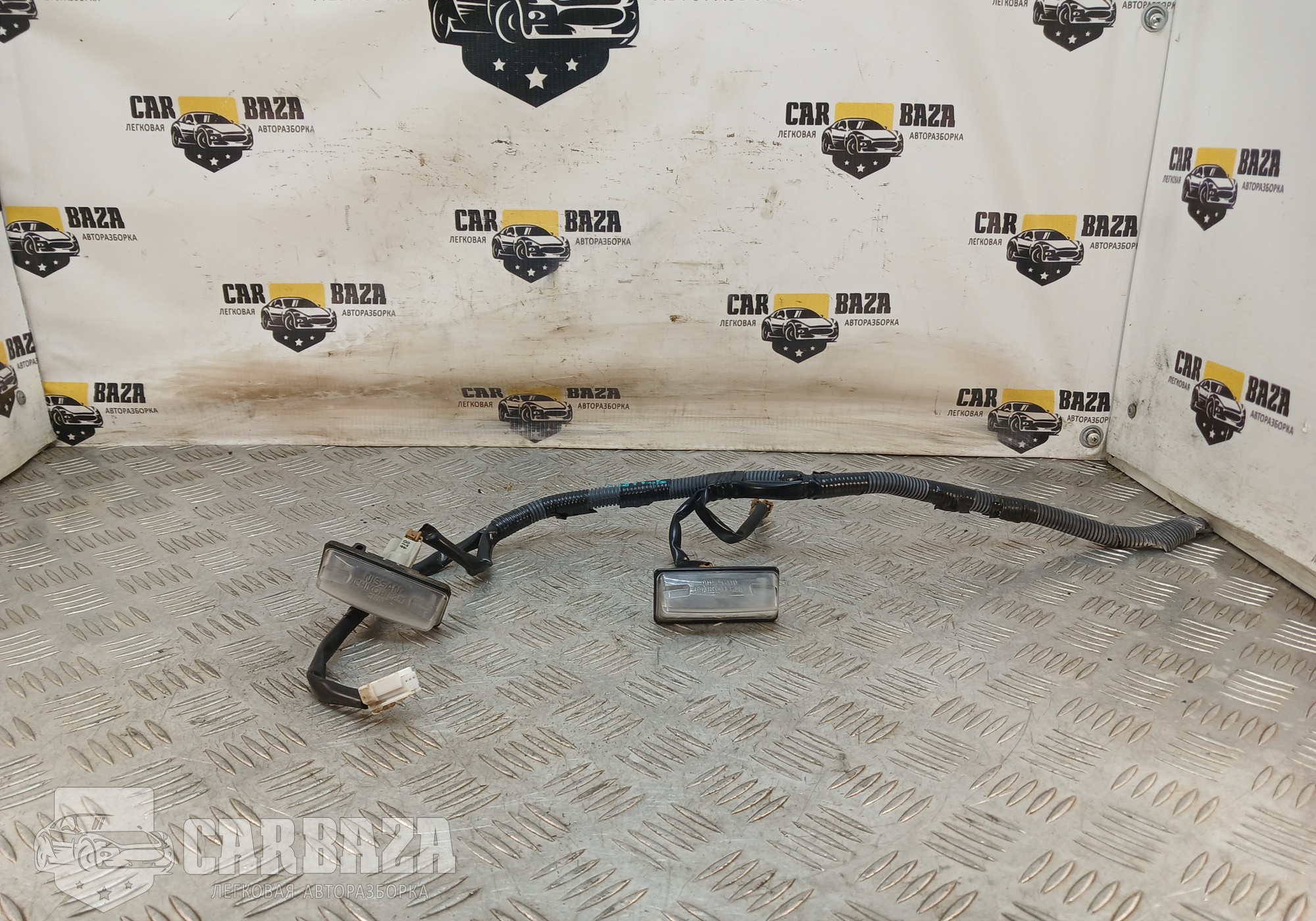 26510EL000 Фонари подсветки номера С11 для Nissan Tiida I (с 2004 по 2014)