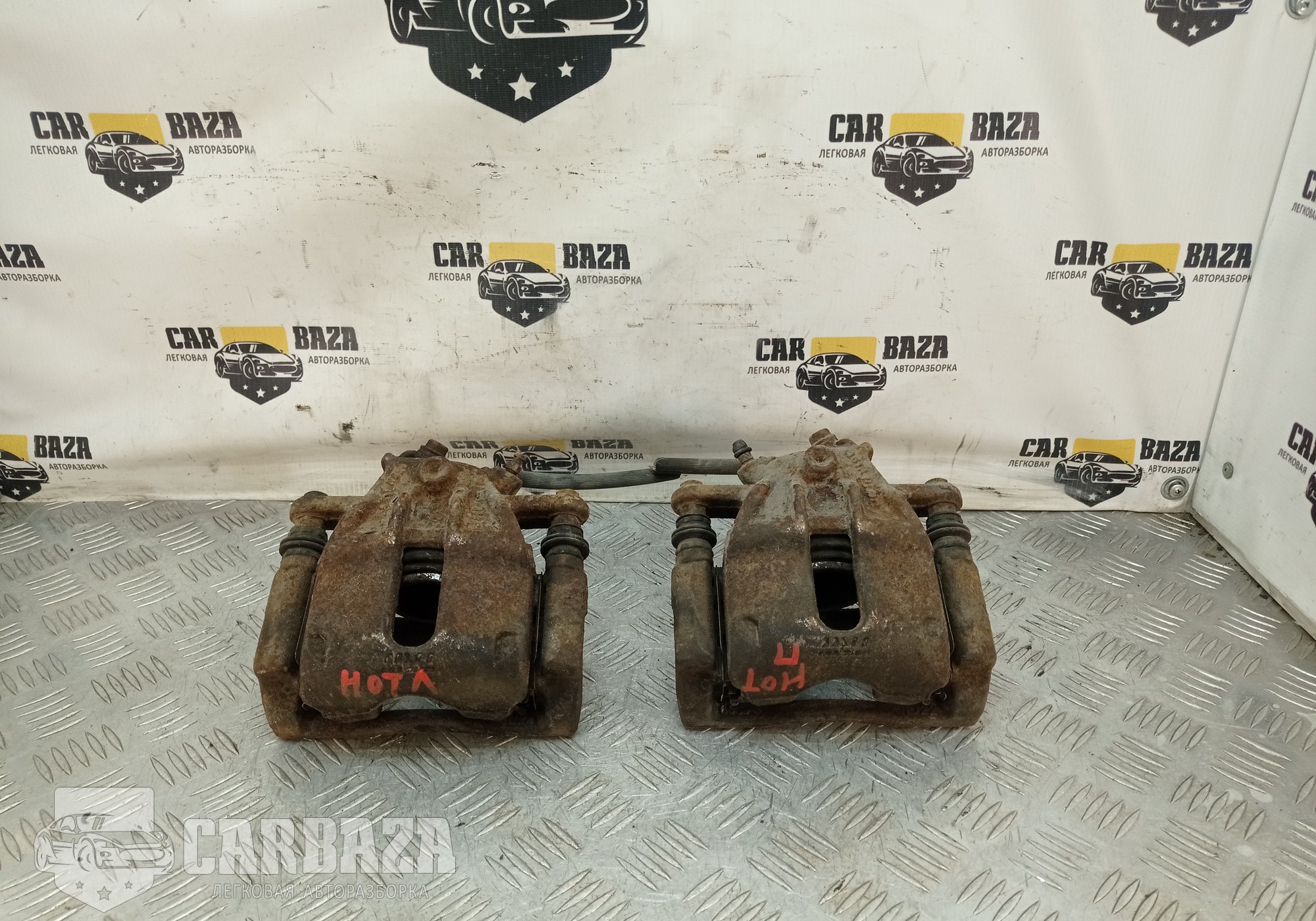 41001AX60A Суппорта тормозные передние E11