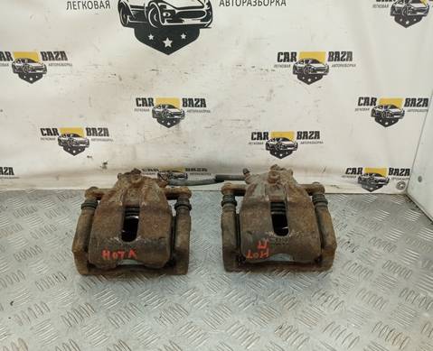 41001AX60A Суппорта тормозные передние E11 для Nissan Note I (с 2006 по 2013)