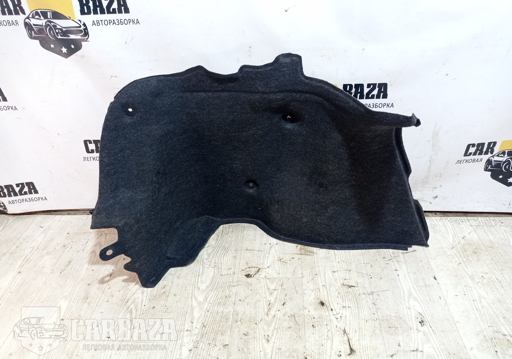 84941EM30A Обшивка багажника задняя левая для Nissan Tiida I (с 2004 по 2014)