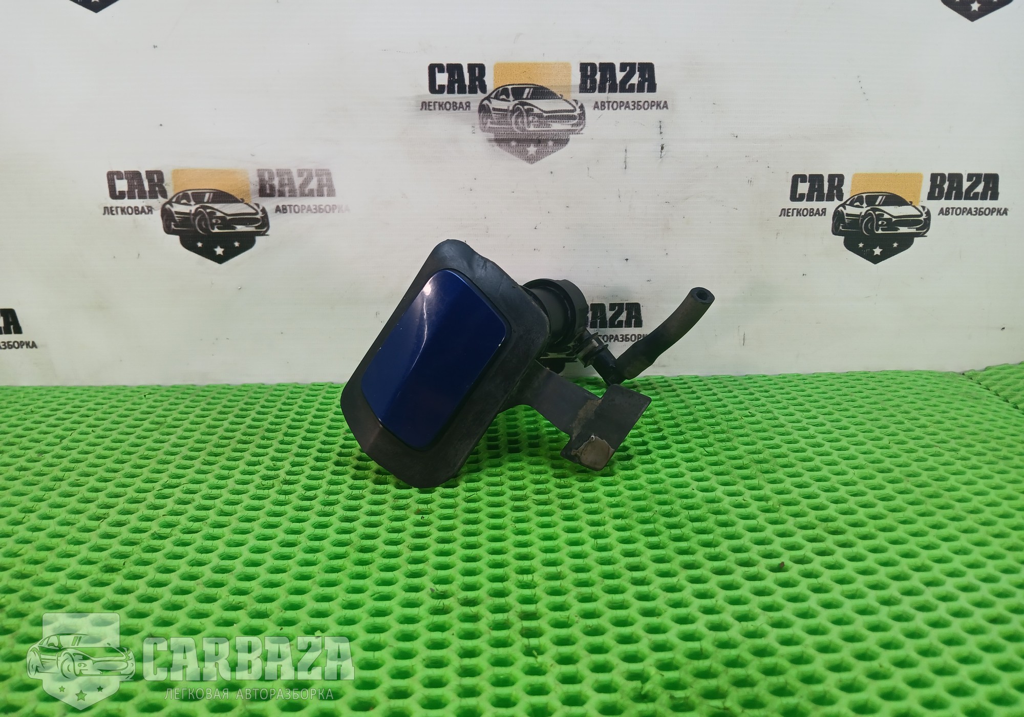 325769024 Форсунка омывателя левая для Opel Zafira B (с 2005 по 2014)