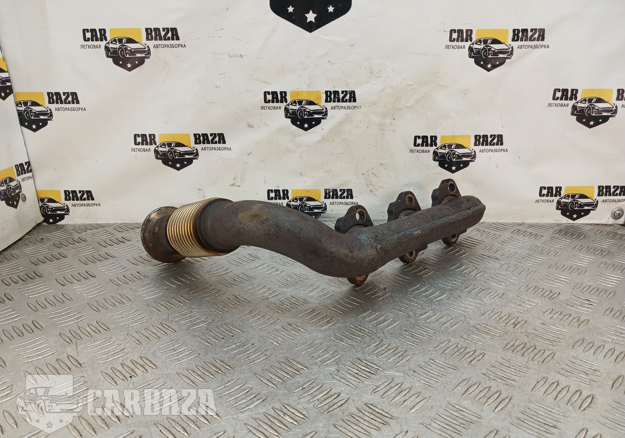 1400400Q0M Коллектор выпускной левый