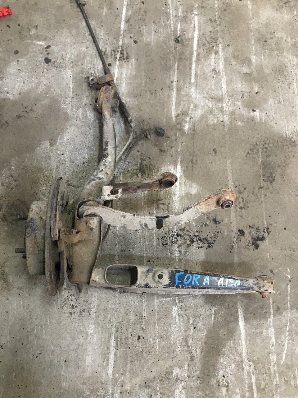 Цапфа ( кулак) задняя левая Chery Fora / A5