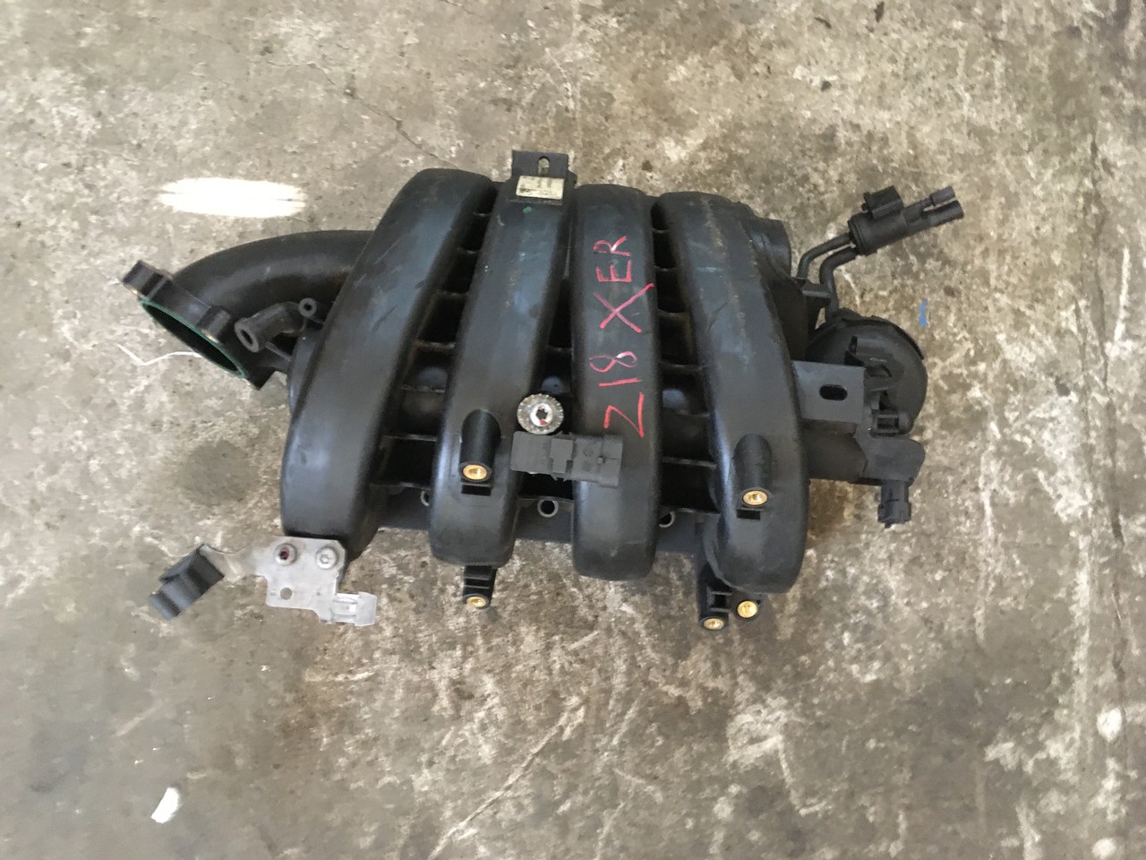 Коллектор впускной Z18XER Opel Astra H