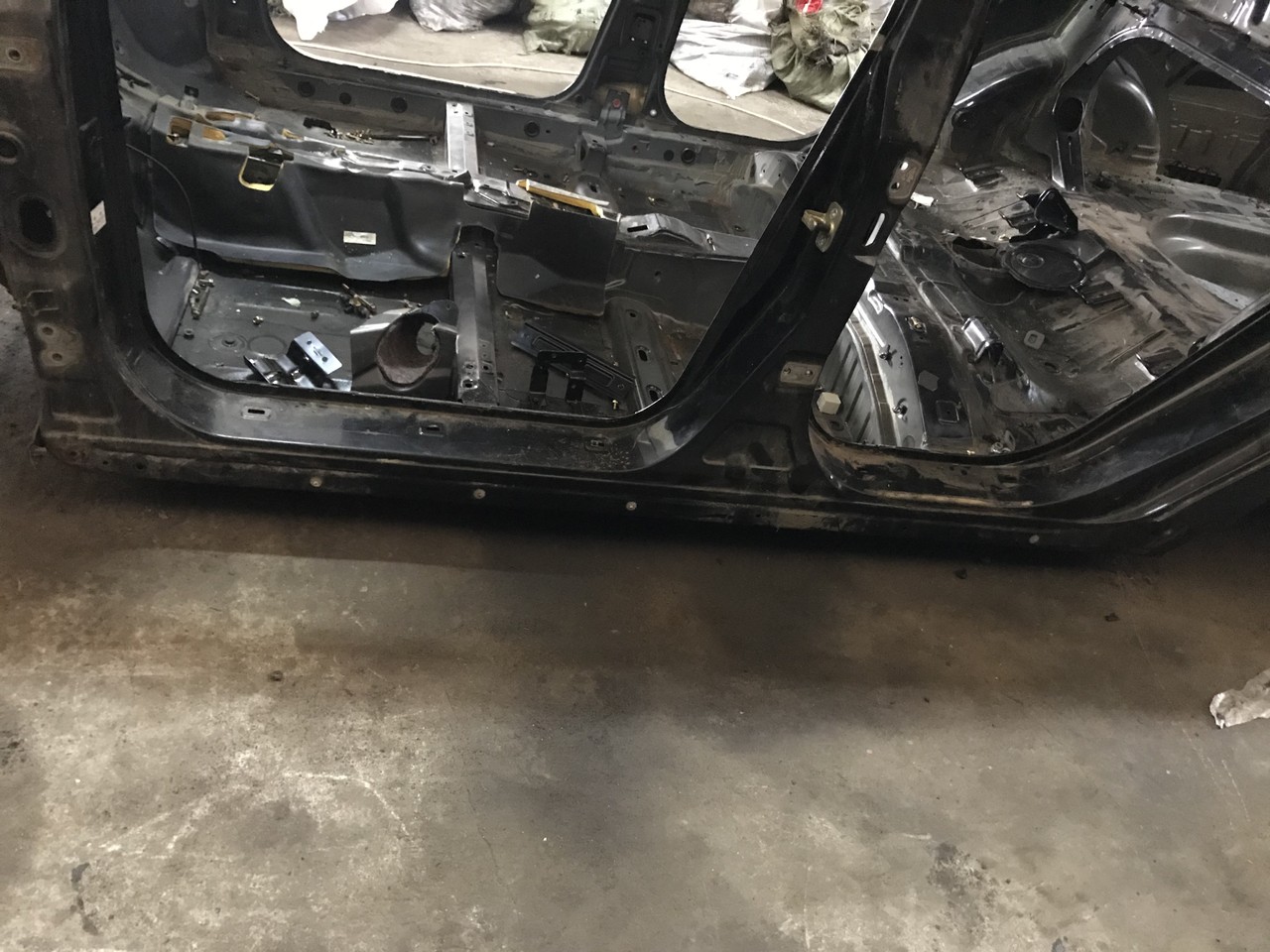 Порог со стойкой левый Geely Emgrand EC7