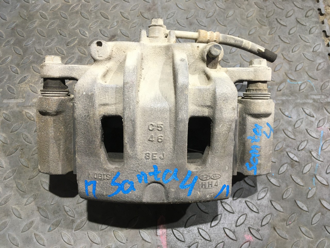 Суппорт передний левый Hyundai Santa Fe IV