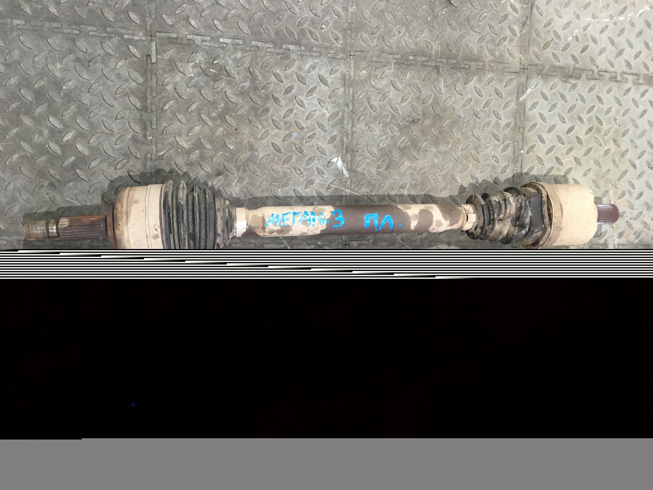 Полуось (привод) левый Renault Megane III