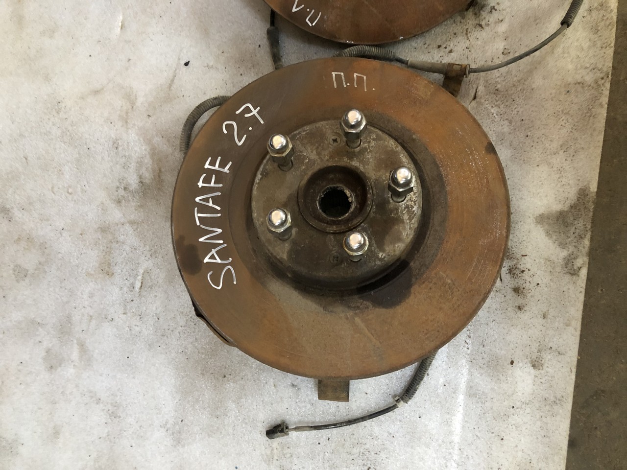 Кулак поворотный передний правый Hyundai Santa Fe II