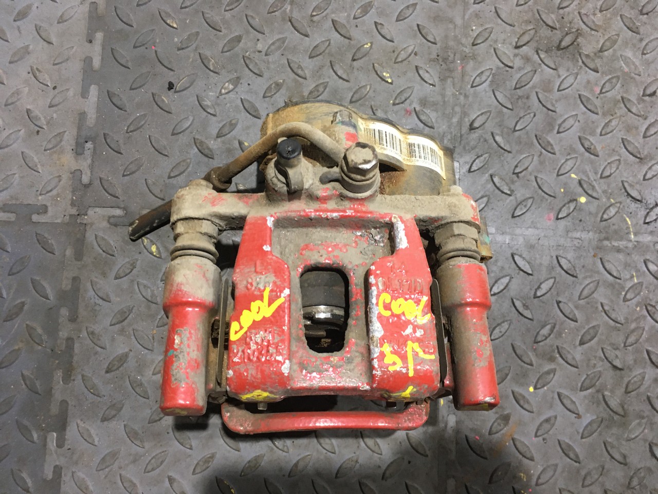 Суппорт задний левый Geely Coolray