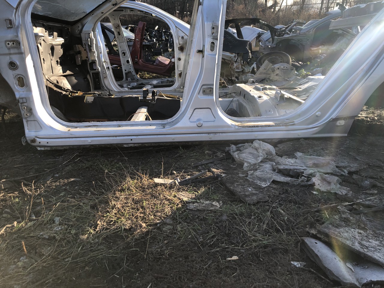 Порог со стойкой левый Geely Emgrand EC7