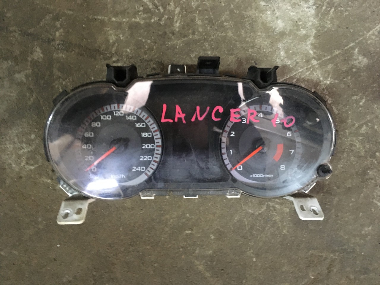 Панель приборов Mitsubishi Lancer X