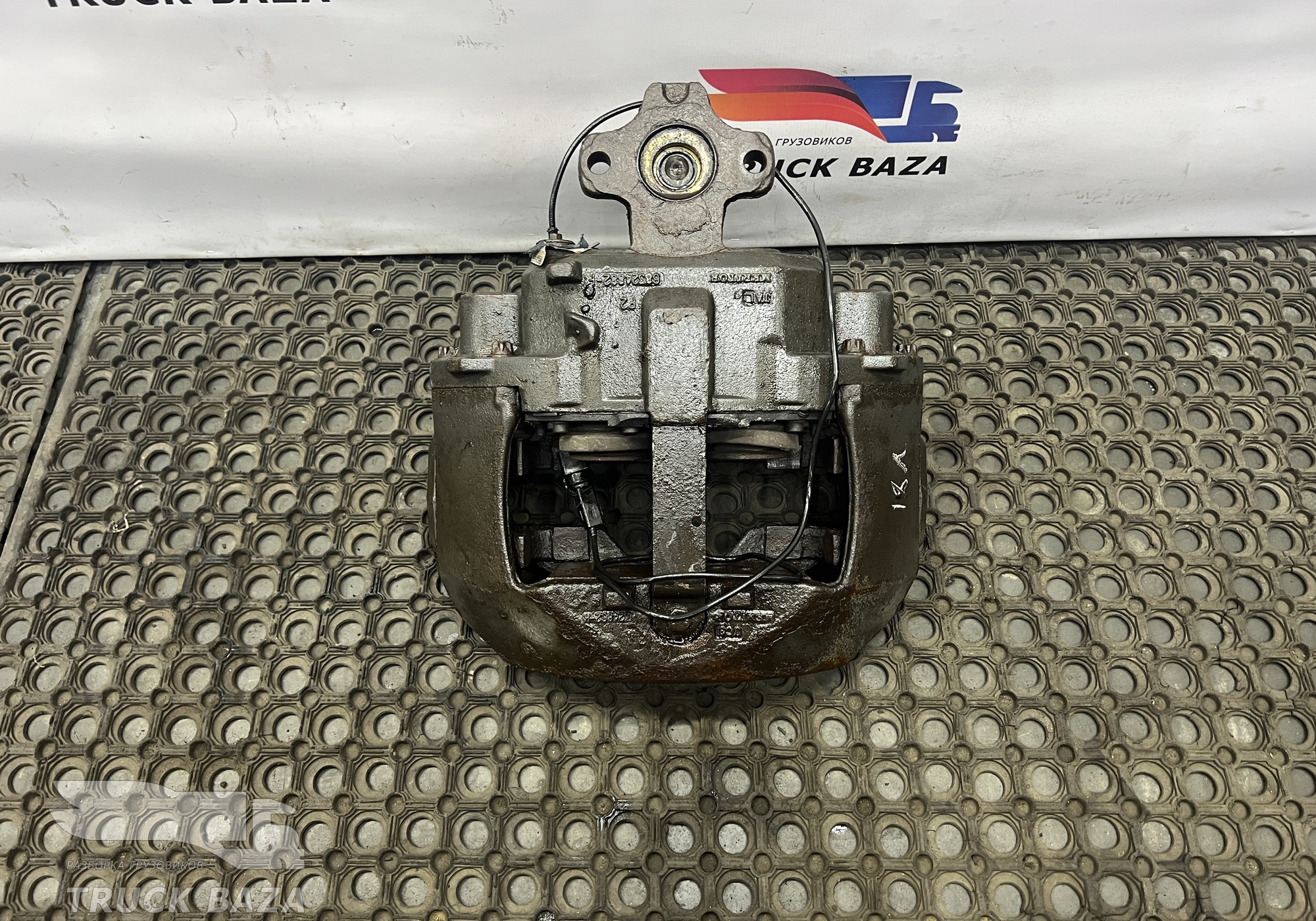 21487605 Суппорт передний правый