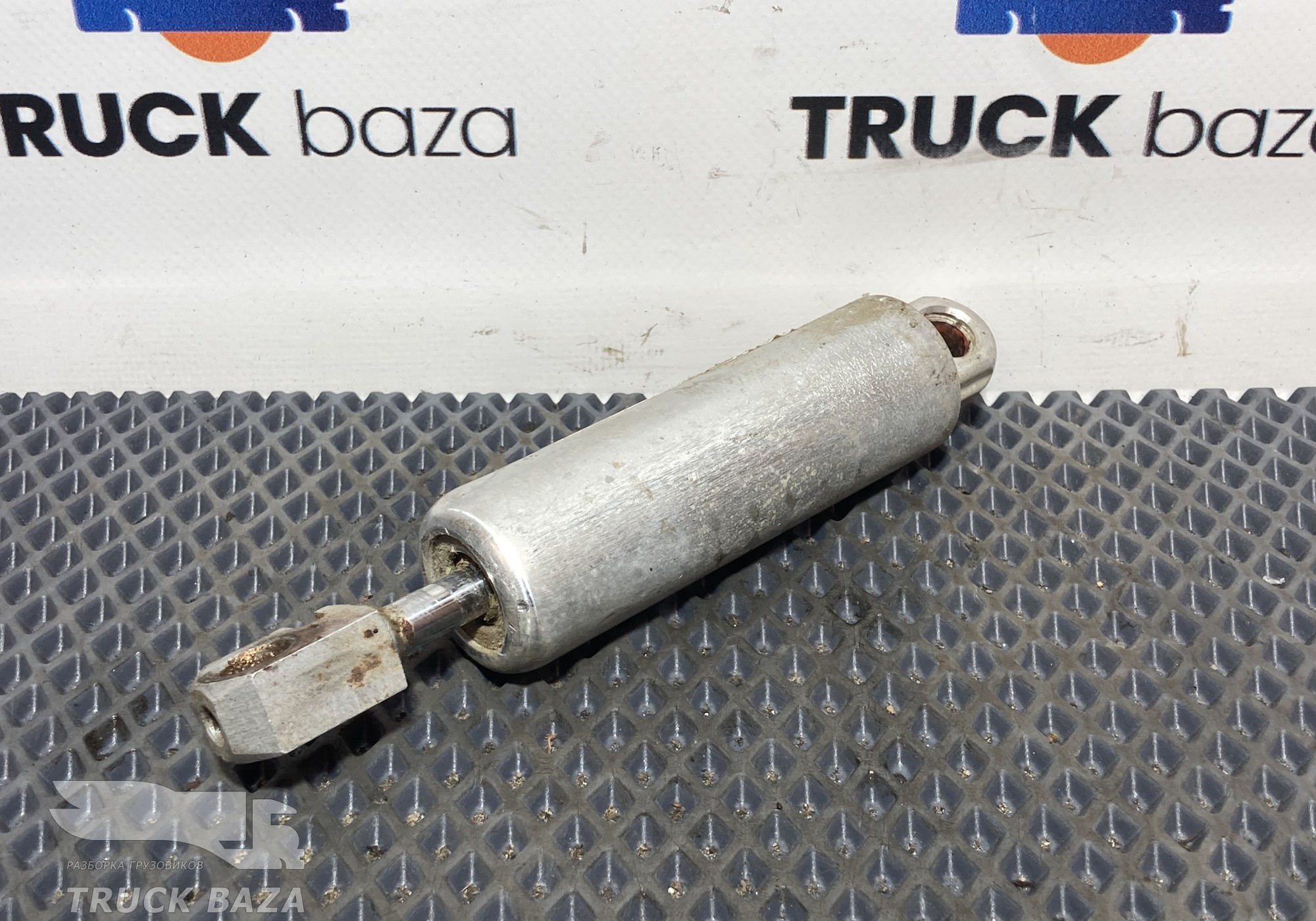 1094942 Амортизатор сиденья пневматического