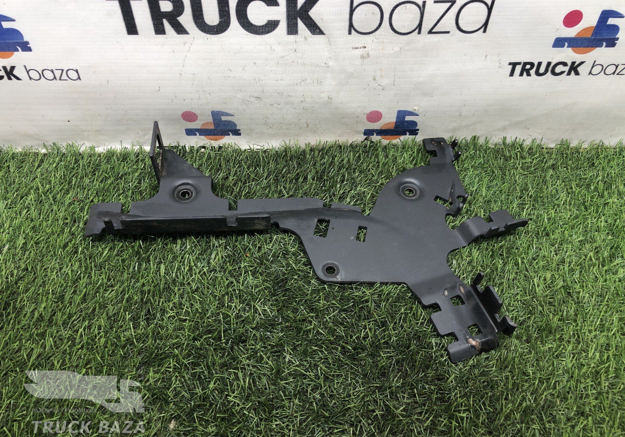 2367056 Кронштейн проводки КПП