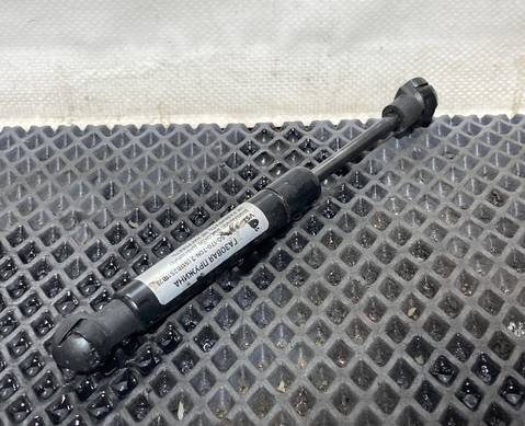 384590 Амортизатор бардачка верхнего для КАМАЗ 54901