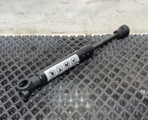 384590 Амортизатор бардачка верхнего для КАМАЗ 54901