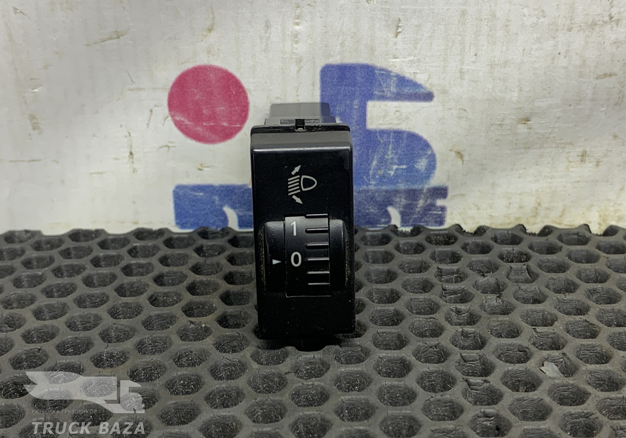 WG9918586009 Кнопка корректора фар для Sinotruk Howo T5G