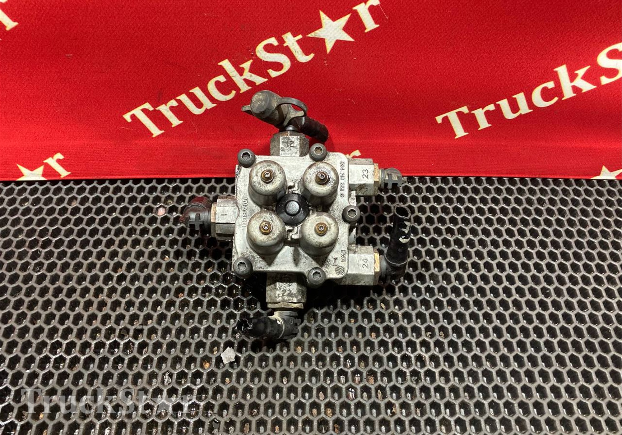 WG9000360523 Кран 4-х контурный 2023г для Sinotruk Sitrak C7H