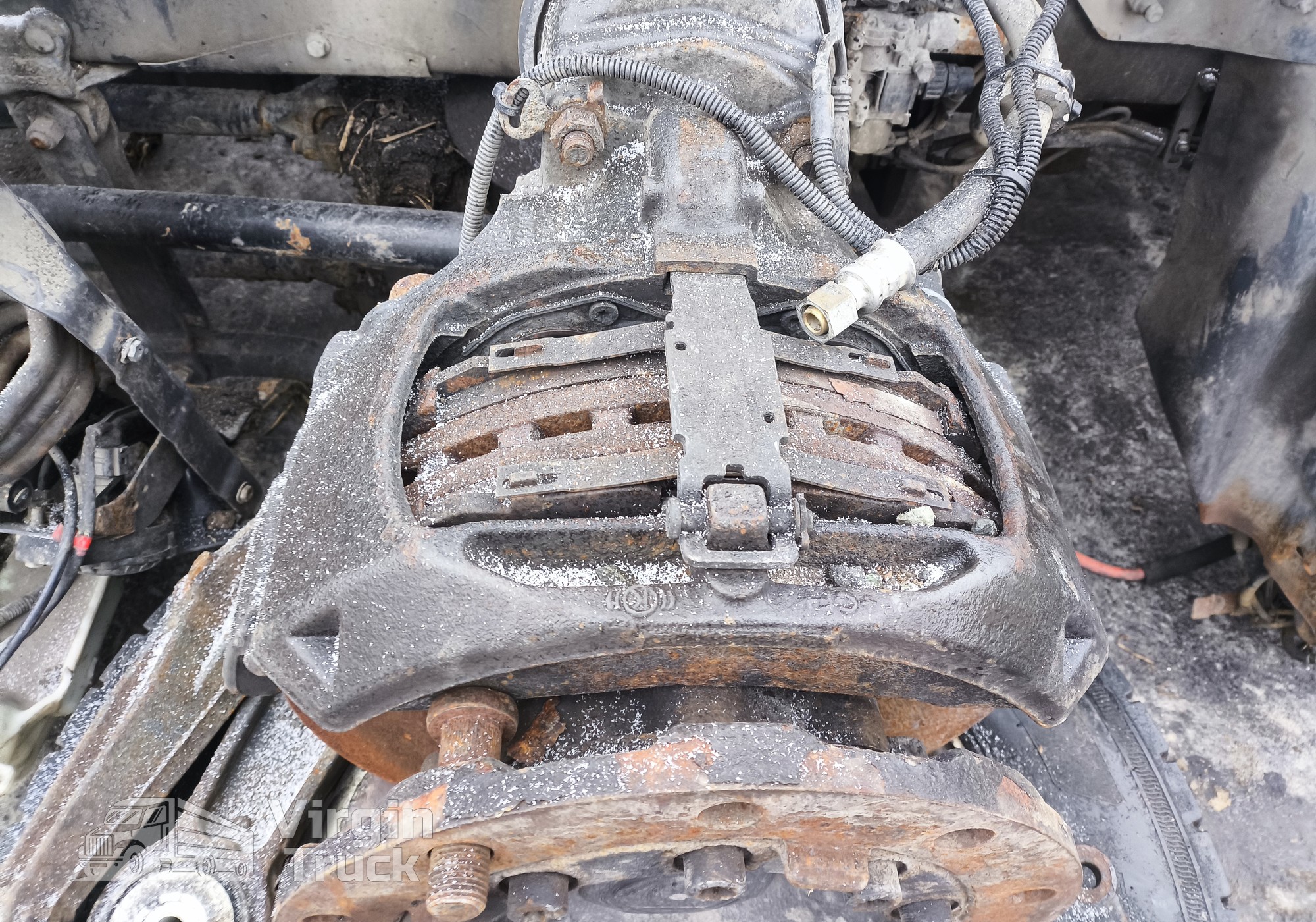 1928820 Суппорт тормозной левый